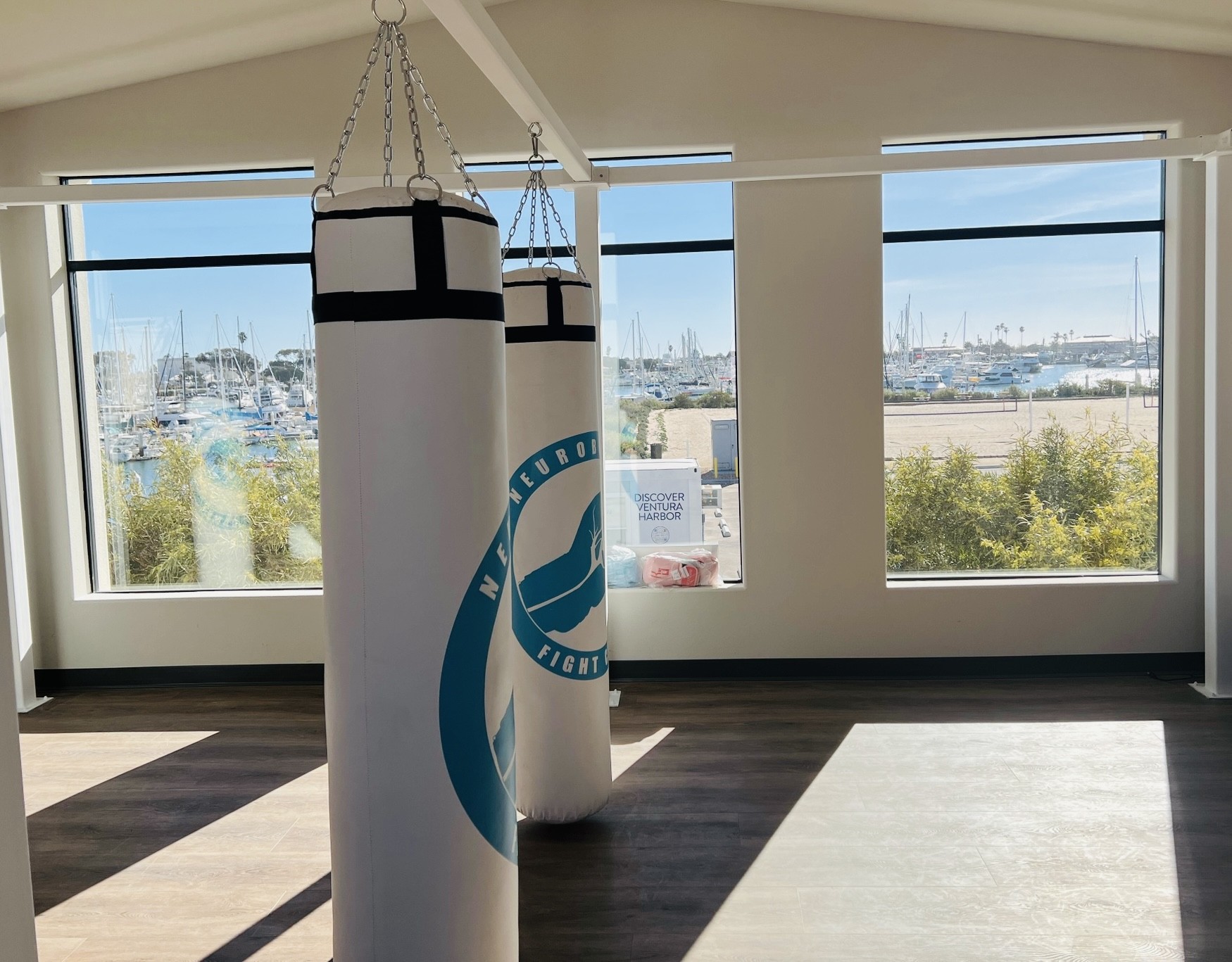 Portside Fitness kickboxing studio with harbor view.