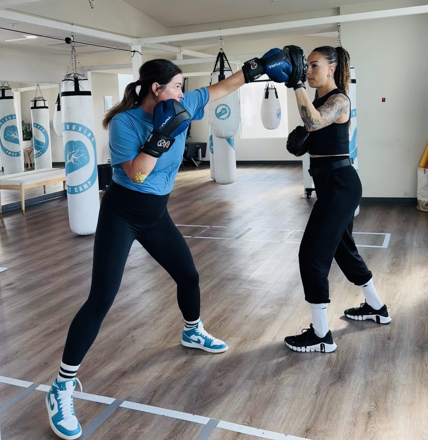 1-on-1 personal training mitt work session at Portside Fitness.