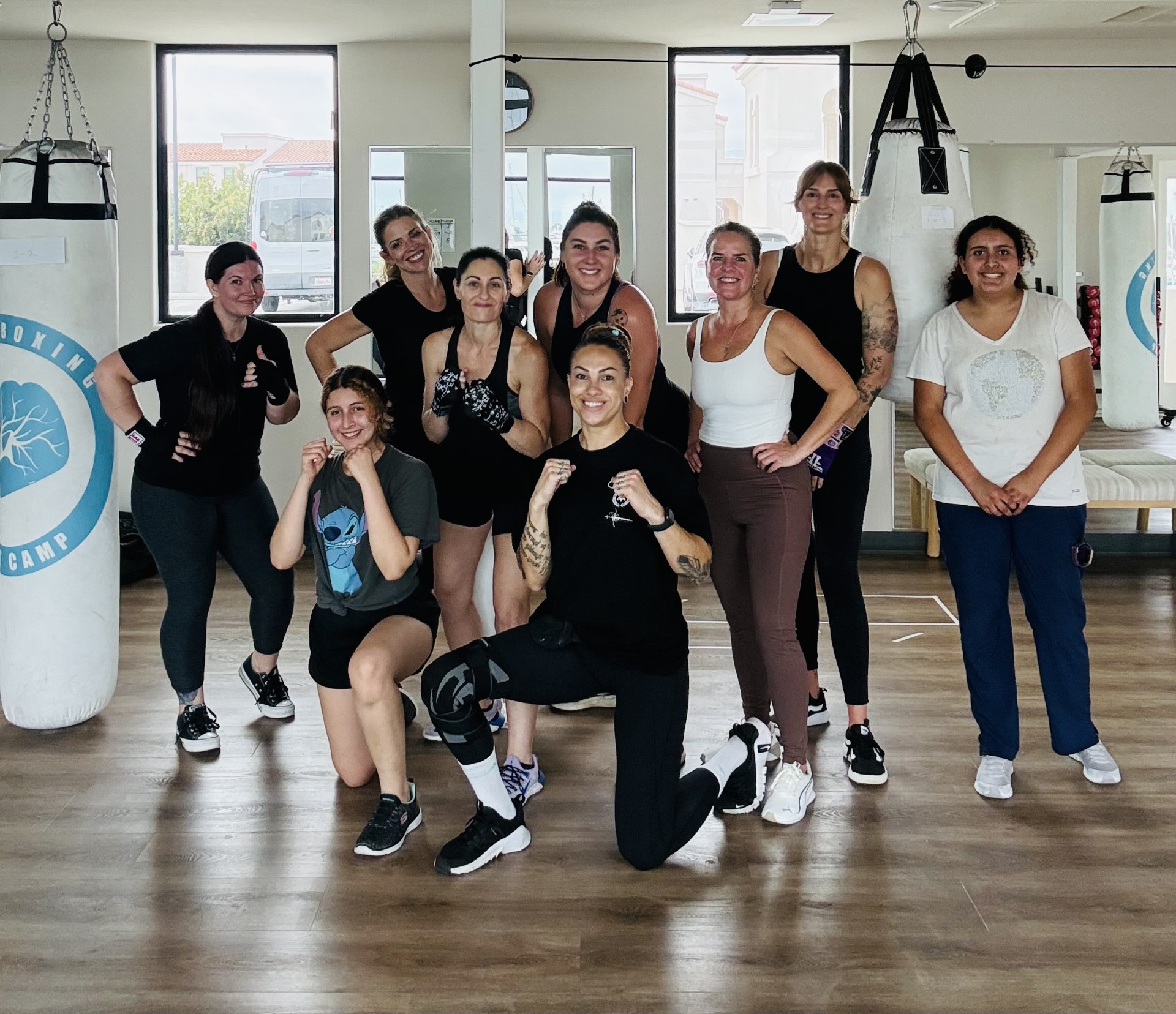 Women's boxing class group at Portside Fitness.